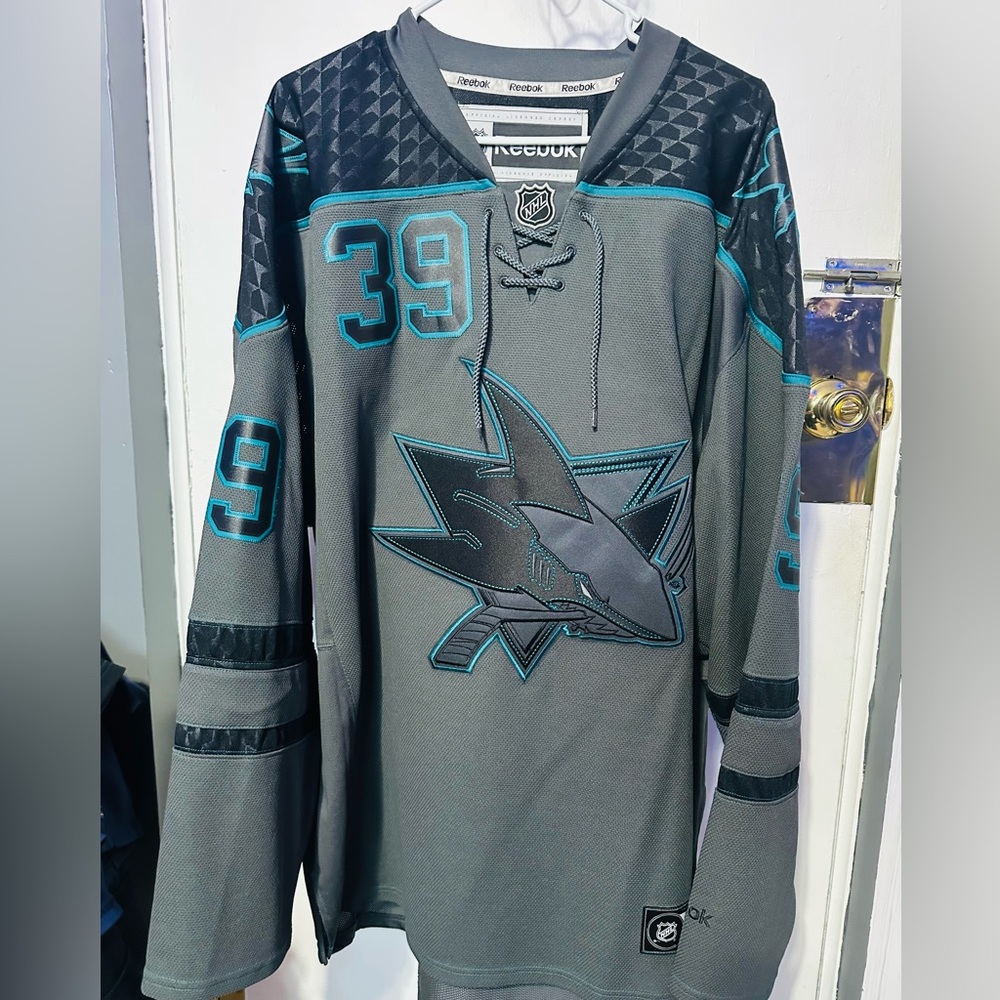 Extremely rare Reebok Charcoal and Teal accelerator hockey Jersey. Size xxl